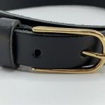 zwarte riem met gouden gesp