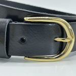 zwarte riem met gouden gesp