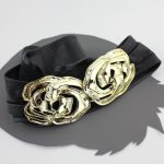 zwarte riem met gouden gesp