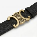 zwarte riem met gouden gesp