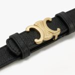 zwarte riem met gouden gesp
